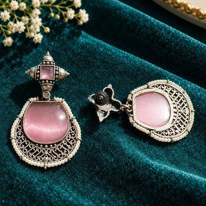 Back view of The Ancestral Crest Drops showing the antique silver-tone metalwork, earring post and fastening construction.”