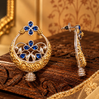 Side view of Azure Courtyard Earrings showing the dimensional circular structure, detailed metalwork and post-back fastening.