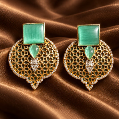 Mint green Sovereign Court Earrings featuring contrasting geometric stones, ornate gold-tone detailing and a clear zircon-edged frame
