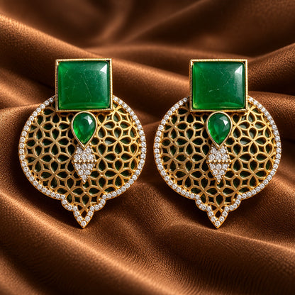 Emerald green Sovereign Court Earrings featuring contrasting geometric stones, ornate gold-tone detailing and a clear zircon-edged frame