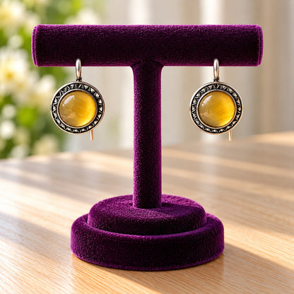  Golden Amber Ottoman Round Earrings showing smooth domed stones and intricate geometric antique-metal detailing.