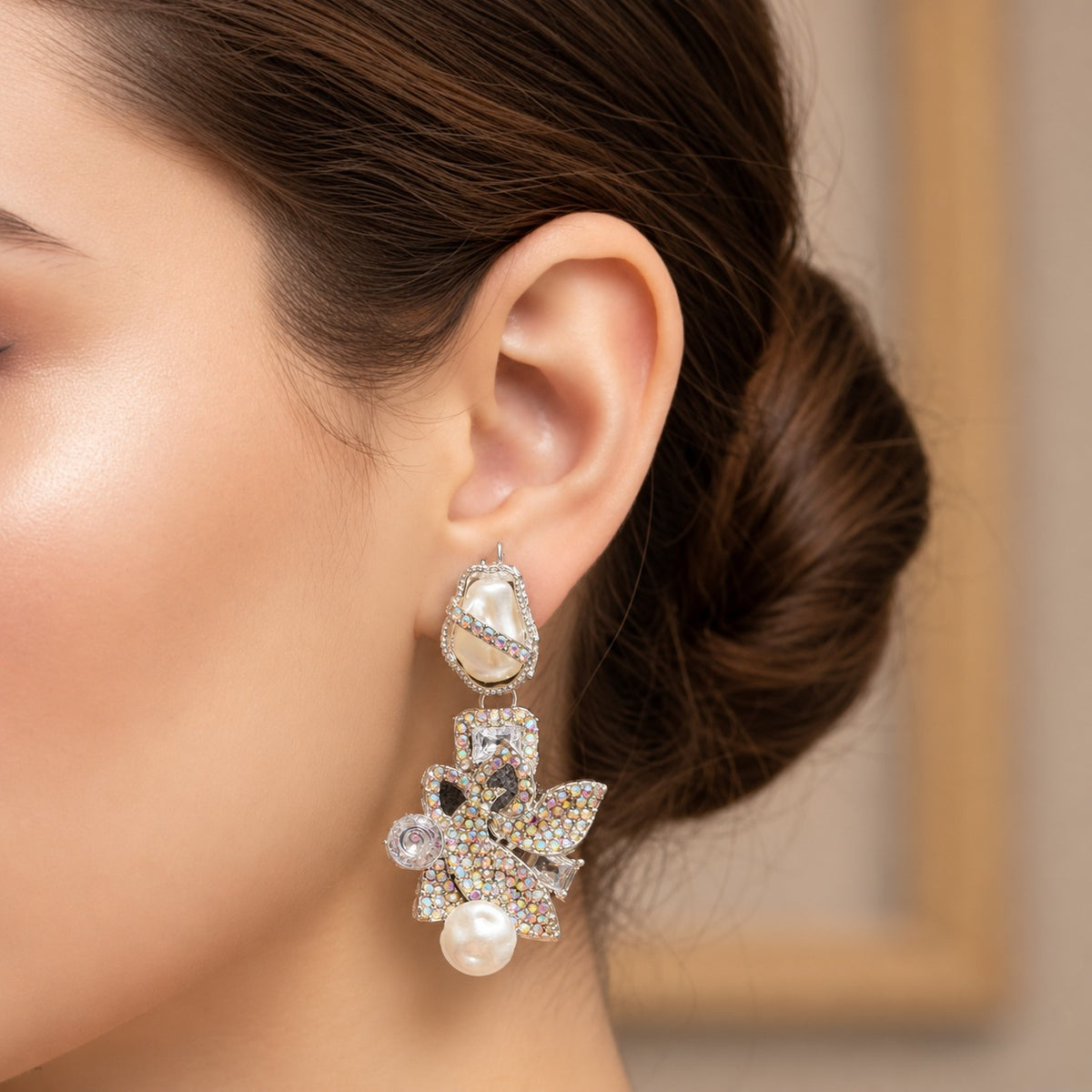 Model wearing Baroque Mosaic statement earrings with intricate crystal embellishments and pearl accents.