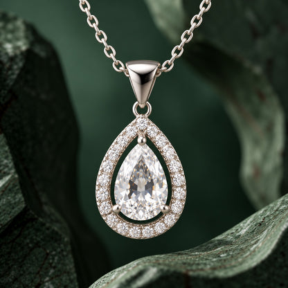 Close-up of the Aurelle Pear Zircon Pendant highlighting its faceted pear-shaped centre stone, zircon border and polished silver-tone finish