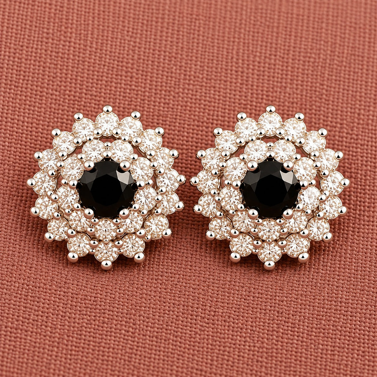Detailed close-up of black  Kensington Cluster Studs highlighting the faceted mint-green centre stones, intricate circular arrangement and surrounding clear zircon detailing.
