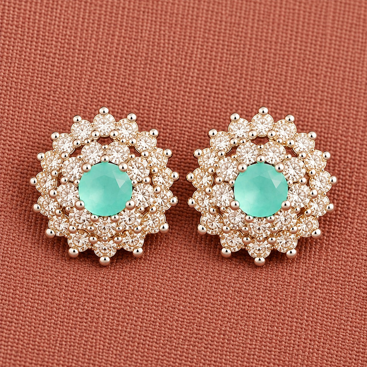 Detailed close-up of Aqua Mint Kensington Cluster Studs highlighting the faceted mint-green centre stones, intricate circular arrangement and surrounding clear zircon detailing.