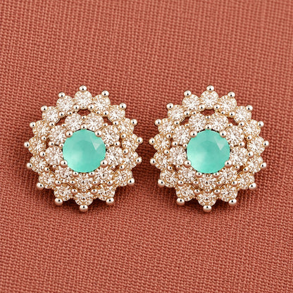 Detailed close-up of Aqua Mint Kensington Cluster Studs highlighting the faceted mint-green centre stones, intricate circular arrangement and surrounding clear zircon detailing.