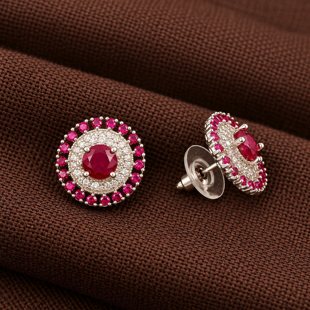 Side-angle view of the Regent Medallion Studs , highlighting the raised centre gemstone, intricate circular setting, and push-back fastening.