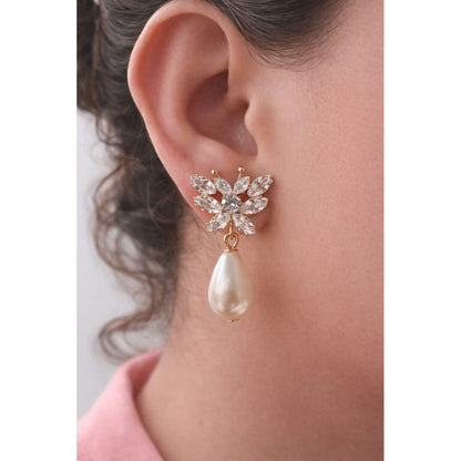 Gold butterfly crystal pearl drop earring on model ear side profile showing butterfly wing crystals and teardrop pearl detail